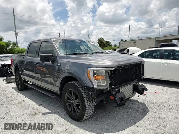 2021 Ford F-150 XL with VIN 1FTFW1E87MFC00633, listed as a Copart auction lot 65318235 with 91,264 mi miles and Salvage title. Bid and sale history available at DreamBid. Image 14.