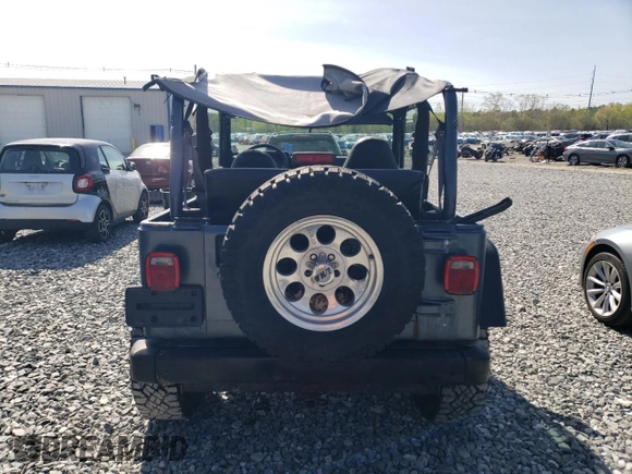 2002 Jeep Wrangler Sport with VIN 1J4FA49S92P715480, listed as a Copart auction lot 55157545 with 153,560 mi miles and Clean Title. Bid and sale history available at carsss.com. Image 7.