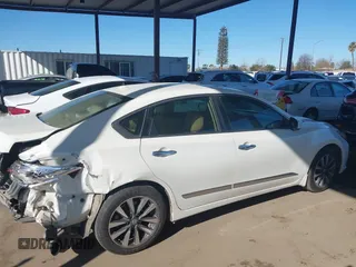 2016 Nissan Altima SV with VIN 1N4AL3APXGC193085, listed as a IAAI auction lot 41507049 with 105,058 mi miles and . Bid and sale history available at DreamBid. Image 14.