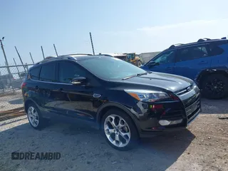 2016 Ford Escape Titanium with VIN 1FMCU0JX5GUC88013, listed as a IAAI auction lot 41933751 with 77,789 mi miles. Bid and sale history available at carsss.com. Image 13.