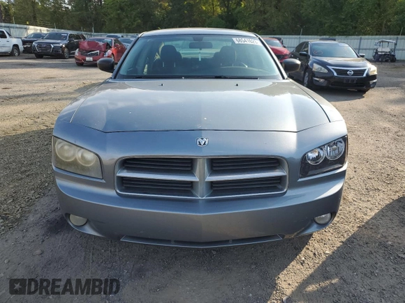2007 Dodge Charger SXT z VIN 2B3KK43G57H823145, wystawiony jako Copart lot #74926923 z przebiegiem 193 591 mil mil oraz Szkoda całkowita • Salvage title. Historia ofert i sprzedaży dostępna na DreamBid. Obrazek 9.