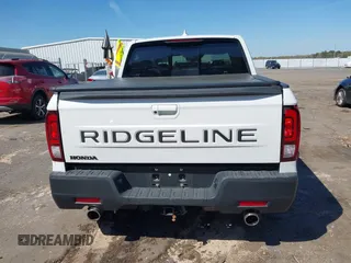 2024 Honda Ridgeline RTL z VIN 5FPYK3F54RB026656, wystawiony jako IAAI lot #41878732 z przebiegiem 15 585 mil mil oraz . Historia ofert i sprzedaży dostępna na DreamBid. Obrazek 16.