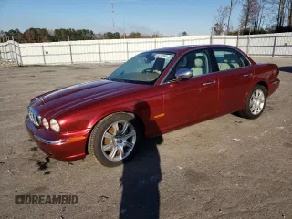 2004 Jaguar XJ VDP with VIN SAJWA74C14SG25722, listed as a Copart auction lot 84757994 with 62,152 mi miles and Salvage Title. Bid and sale history available at carsss.com. Image 1.