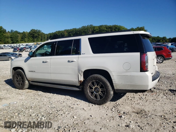2016 GMC Yukon XL SLT with VIN 1GKS2GKC4GR198451, listed as a Copart auction lot 70073714 with 194,939 mi miles and Salvage Title. Bid and sale history available at carsss.com. Image 2.