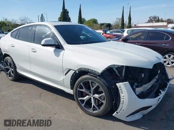 2022 BMW X6 M50i z VIN 5UXCY8C01N9J14882, wystawiony jako IAAI lot #41856966 z przebiegiem 22 893 mil mil oraz . Historia ofert i sprzedaży dostępna na DreamBid. Obrazek 14.