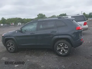 2017 Jeep Cherokee Trailhawk z VIN 1C4PJMBS2HW532974, wystawiony jako IAAI lot #42523785 z przebiegiem 74 272 mil mil oraz . Historia ofert i sprzedaży dostępna na DreamBid. Obrazek 14.