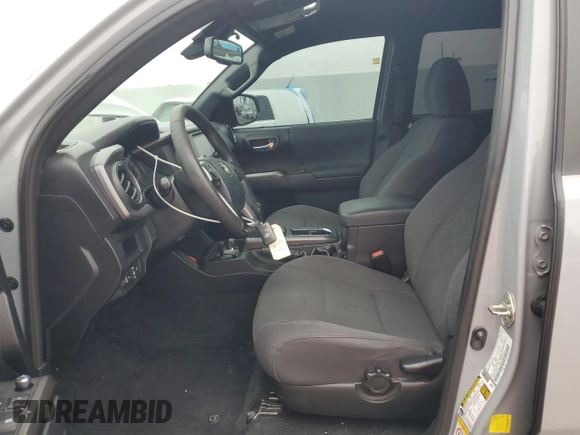 2018 Toyota Tacoma SR5 z VIN 3TMAZ5CN8JM063442, wystawiony jako Copart lot #55141725 z przebiegiem 110 926 mil mil oraz Szkoda całkowita • Salvage title. Historia ofert i sprzedaży dostępna na DreamBid. Obrazek 7.