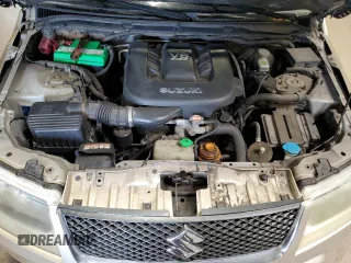 2007 Suzuki Grand Vitara z VIN JS3TD941874204462, wystawiony jako Copart lot #67671174 z przebiegiem 174 844 mil mil oraz Szkoda całkowita • Salvage title. Historia ofert i sprzedaży dostępna na DreamBid. Obrazek 12.