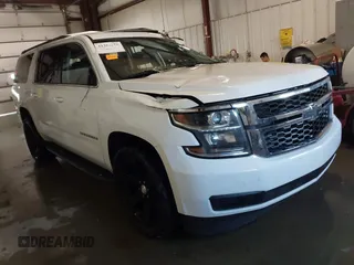 2017 Chevrolet Suburban LT with VIN 1GNSKHKCXHR328405, listed as a IAAI auction lot 41353035 with 127,095 mi miles. Bid and sale history available at carsss.com. Image 1.
