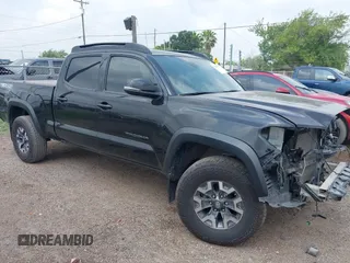 2023 Toyota Tacoma SR5 z VIN 3TMDZ5BN9PM147969, wystawiony jako IAAI lot #42206727 z przebiegiem 69 206 mil mil oraz . Historia ofert i sprzedaży dostępna na DreamBid. Obrazek 1.
