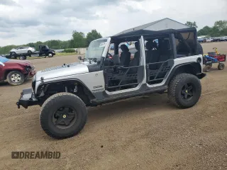 2012 Jeep Wrangler Unlimited Sport with VIN 1C4BJWDG7CL112989, listed as a Copart auction lot 62634715 with 142,032 mi miles and Salvage title. Bid and sale history available at DreamBid. Image 1.