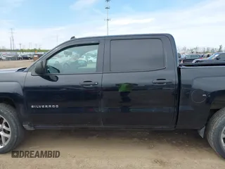 2014 Chevrolet Silverado 1500 LT with VIN 3GCUKREC5EG212432, listed as a IAAI auction lot 42066660 with 190,609 mi miles and . Bid and sale history available at DreamBid. Image 14.