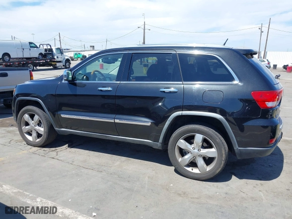 2012 Jeep Grand Cherokee Overland with VIN 1C4RJFCT7CC185602, listed as a IAAI auction lot 42018715 with 91,507 mi miles. Bid and sale history available at carsss.com. Image 14.