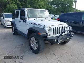 2016 Jeep Wrangler Unlimited Sport RHD z VIN 1C4BJWKG3GL293694, wystawiony jako IAAI lot #42569773 z przebiegiem 140 243 mil mil oraz . Historia ofert i sprzedaży dostępna na DreamBid. Obrazek 1.