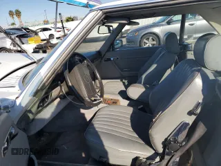1987 Mercedes-Benz 560 SL with VIN WDBBA48D8HA066224, listed as a Copart auction lot 87976835 with 196,054 mi miles and Salvage Title. Bid and sale history available at DreamBid. Image 7.