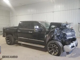 2014 Chevrolet Silverado 1500 LT with VIN 3GCUKREC4EG413190, listed as a Copart auction lot 49233565 with 107,378 mi miles and Salvage Title. Bid and sale history available at carsss.com. Image 4.