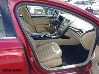 2014 Ford Fusion Energi SE Luxury with VIN 3FA6P0PUXER234528, listed as a IAAI auction lot 41644935 with 151,059 mi miles. Bid and sale history available at carsss.com. Image 5.