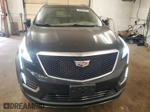 2021 Cadillac XT5 AWD Sport with VIN 1GYKNHRS1MZ103033, listed as a Copart auction lot 58586425 with 65,229 mi miles and Salvage title. Bid and sale history available at DreamBid. Image 5.