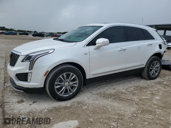 2022 Cadillac XT5 FWD Premium Luxury z VIN 1GYKNCRS0NZ175748, wystawiony jako Copart lot #61651885 z przebiegiem 13 747 mil mil oraz Szkoda całkowita • Salvage title. Historia ofert i sprzedaży dostępna na DreamBid. Obrazek 1.