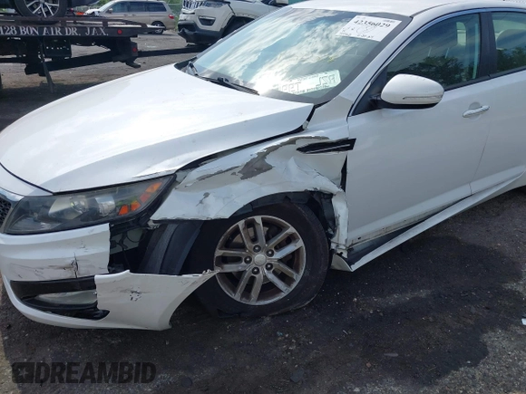 2013 Kia Optima LX z VIN KNAGM4A79D5312328, wystawiony jako IAAI lot #42356029 z przebiegiem 194 562 mil mil oraz . Historia ofert i sprzedaży dostępna na DreamBid. Obrazek 6.