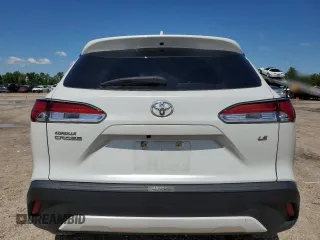 2023 Toyota Corolla Cross LE z VIN 7MUCAAAG1PV066534, wystawiony jako Copart lot #56206465 z przebiegiem 20 792 mil mil oraz Szkoda całkowita • Salvage title. Historia ofert i sprzedaży dostępna na DreamBid. Obrazek 6.