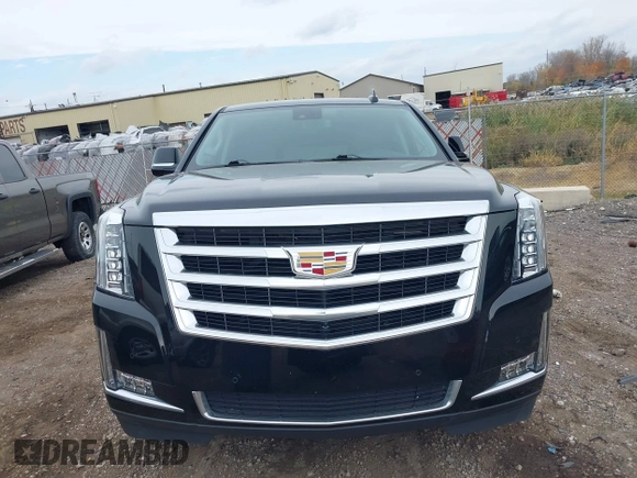 2019 Cadillac Escalade Luxury z VIN 1GYS4BKJ1KR398505, wystawiony jako IAAI lot #40662422 z przebiegiem 57 932 mil mil oraz . Historia ofert i sprzedaży dostępna na DreamBid. Obrazek 12.