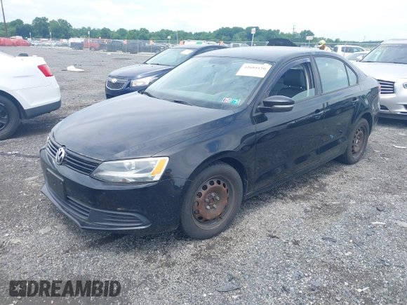 2014 Volkswagen Jetta SE with VIN 3VWD17AJ2EM428149, listed as a IAAI auction lot 42684150 with 206,924 mi miles and . Bid and sale history available at DreamBid. Image 2.