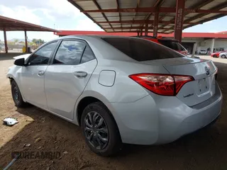 2018 Toyota Corolla L with VIN 2T1BURHE3JC051646, listed as a IAAI auction lot 41959264 with 123,036 mi miles and . Bid and sale history available at DreamBid. Image 3.