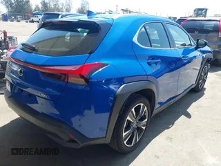 2022 Lexus UX with VIN JTHX3JBH0N2049742, listed as a IAAI auction lot 41917341 with 18,728 mi miles. Bid and sale history available at carsss.com. Image 4.