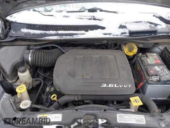 2014 Dodge Grand Caravan SXT with VIN 2C4RDGCGXER308657, listed as a IAAI auction lot 41602422 with 200,643 mi miles and . Bid and sale history available at DreamBid. Image 10.