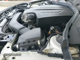 2014 BMW 3 Series 335i Gran Turismo xDrive z VIN WBA3X9C5XED153261, wystawiony jako IAAI lot #42790312 z przebiegiem 62 424 mil mil oraz . Historia ofert i sprzedaży dostępna na DreamBid. Obrazek 20.