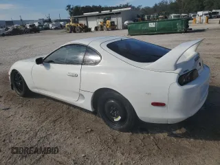1997 Toyota Supra с VIN JT2DD82A4V0038759, выставлен на аукционе Copart как лот 86114544 с пробегом Не указан миль и Списание • Salvage title. История ставок и продаж доступна на DreamBid. Изображение 2.