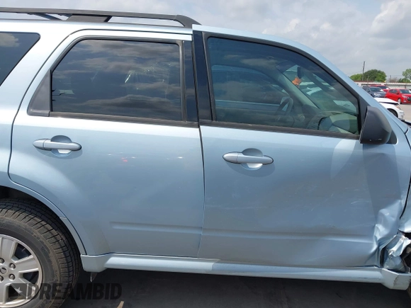 2009 Mercury Mariner with VIN 4M2CU81G09KJ06987, listed as a IAAI auction lot 42120169 with 142,363 mi miles and . Bid and sale history available at DreamBid. Image 13.