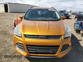 2016 Ford Escape SE with VIN 1FMCU9GXXGUB48888, listed as a Copart auction lot 54942075 with 212,588 mi miles and Salvage Title. Bid and sale history available at carsss.com. Image 5.