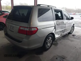 2007 Honda Odyssey EX with VIN 5FNRL384X7B451892, listed as a IAAI auction lot 42020537 with 162,257 mi miles and . Bid and sale history available at DreamBid. Image 4.