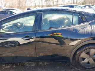 2024 Toyota Prius LE with VIN JTDACAAU9R3037143, listed as a IAAI auction lot 41890522 with 1,792 mi miles and . Bid and sale history available at carsss.com. Image 14.