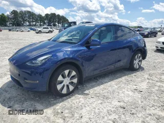 2022 Tesla Model Y Long Range z VIN 7SAYGDEE4NF426893, wystawiony jako Copart lot #55809275 z przebiegiem 16 083 mil mil oraz Szkoda całkowita • Salvage title. Historia ofert i sprzedaży dostępna na DreamBid. Obrazek 1.