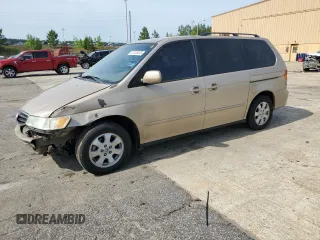 2002 Honda Odyssey EX-L z VIN 5FNRL18922B020150, wystawiony jako Copart lot #57153035 z przebiegiem 223 439 mil mil oraz Szkoda całkowita • Salvage title. Historia ofert i sprzedaży dostępna na DreamBid. Obrazek 1.