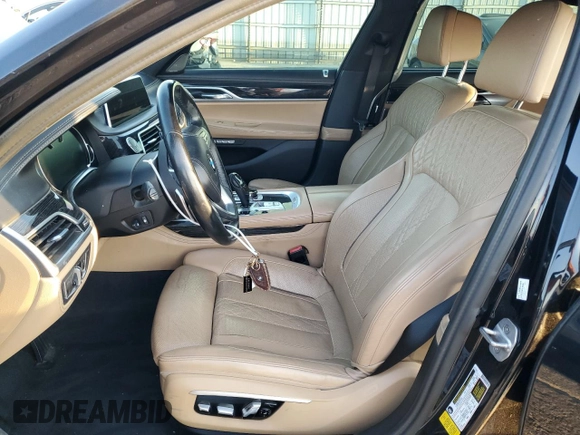 2017 BMW 7 Series 750i with VIN WBA7F0C57HGM21136, listed as a Copart auction lot 88525335 with 102,508 mi miles and Salvage title. Bid and sale history available at DreamBid. Image 7.