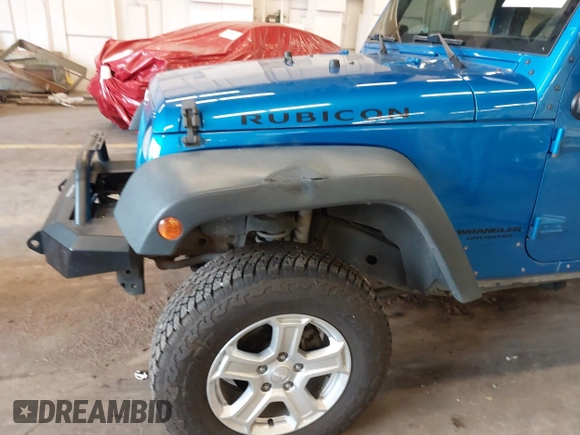 2015 Jeep Wrangler Unlimited Rubicon with VIN 1C4BJWFG7FL661643, listed as a IAAI auction lot 41291385 with 112,785 mi miles. Bid and sale history available at carsss.com. Image 6.