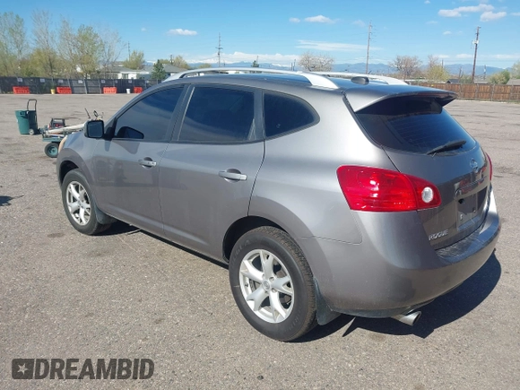 2009 Nissan Rogue S with VIN JN8AS58VX9W440060, listed as a IAAI auction lot 42067756 with 117,849 mi miles. Bid and sale history available at carsss.com. Image 3.