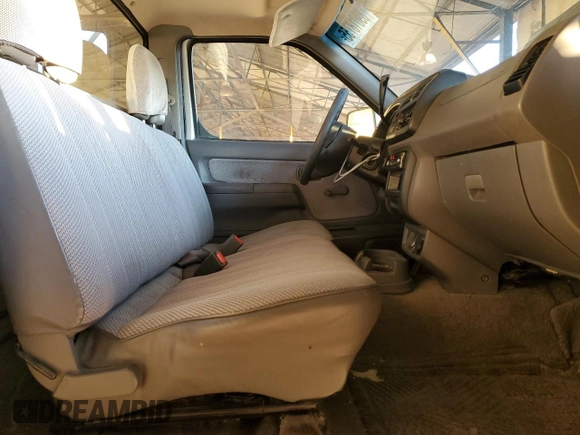 2000 Nissan Frontier XE z VIN 1N6DD21S5YC340513, wystawiony jako Copart lot #89018755 z przebiegiem 237 418 mil mil oraz Szkoda całkowita • Salvage title. Historia ofert i sprzedaży dostępna na DreamBid. Obrazek 10.