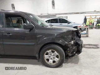 2012 Honda Pilot LX with VIN 5FNYF4H28CB005127, listed as a IAAI auction lot 41742168 with 133,225 mi miles and . Bid and sale history available at carsss.com. Image 6.