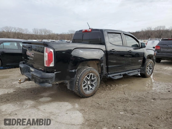 2021 GMC Canyon 4WD AT4 w/Leather with VIN 1GTG6FEN1M1236158, listed as a Copart auction lot 47553775 with 109,010 mi miles and Salvage Title. Bid and sale history available at carsss.com. Image 3.