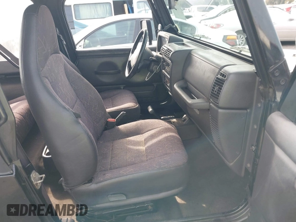 2002 Jeep Wrangler X with VIN 1J4FA39S92P774054, listed as a IAAI auction lot 41470351 with 209,727 mi miles. Bid and sale history available at carsss.com. Image 5.