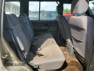1999 Isuzu Trooper S with VIN JACDJ58X6X7924973, listed as a Copart auction lot 57881235 with 269,301 mi miles and Salvage title. Bid and sale history available at DreamBid. Image 10.