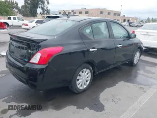 2016 Nissan Versa S Plus with VIN 3N1CN7AP7GL857242, listed as a IAAI auction lot 42135656 with 138,627 mi miles. Bid and sale history available at carsss.com. Image 4.