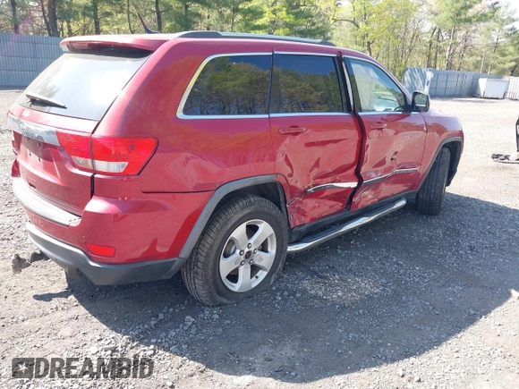 2011 Jeep Grand Cherokee Laredo with VIN 1J4RR4GG5BC512095, listed as a IAAI auction lot 42156490 with 160,749 mi miles. Bid and sale history available at carsss.com. Image 4.