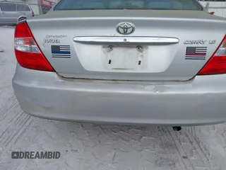 2004 Toyota Camry LE with VIN 4T1BE32K04U286257, listed as a IAAI auction lot 42079619 with 205,634 mi miles. Bid and sale history available at carsss.com. Image 6.