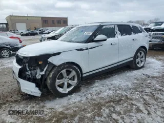 2018 Land Rover Range Rover Velar S z VIN SALYB2RV3JA719433, wystawiony jako Copart lot #53731405 z przebiegiem 49 932 mil mil oraz Szkoda całkowita • Salvage title. Historia ofert i sprzedaży dostępna na DreamBid. Obrazek 1.